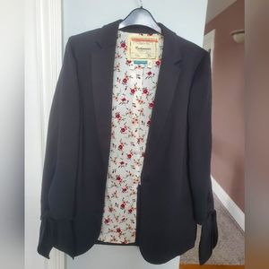 Blazer from Anthropologie Black with tie sleeves Size 04